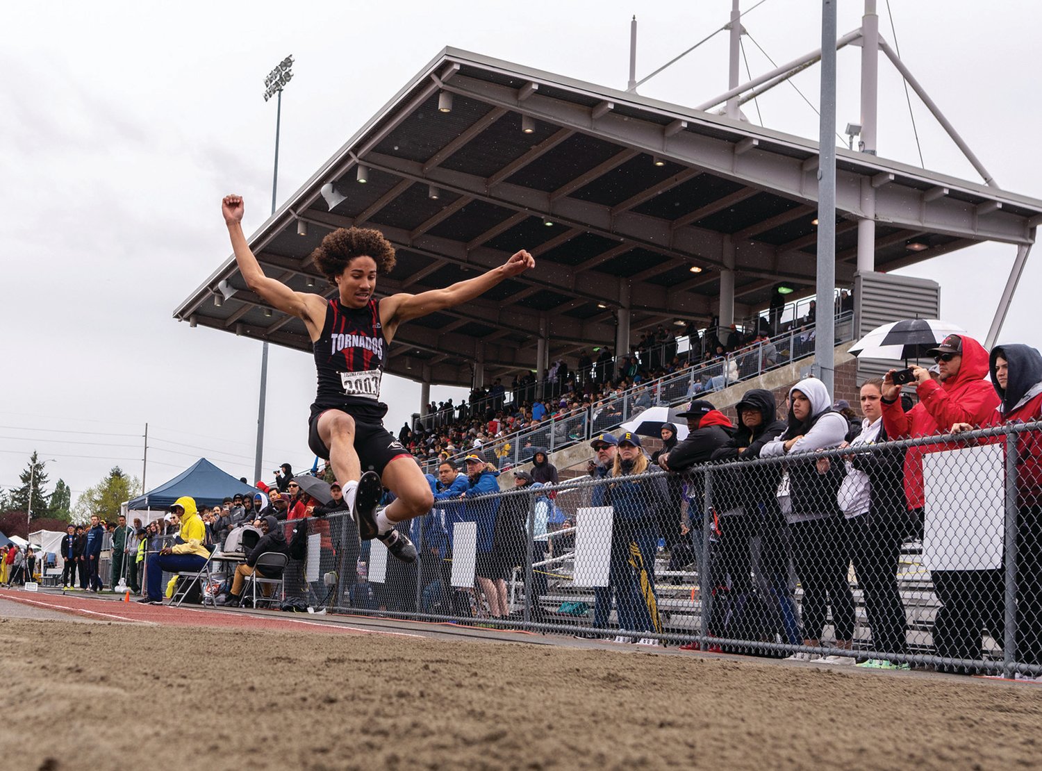 Yelm's Trevontay Smith leaps in the 3A Boys Triple Jump at the 4A/3A/2A State Track and Field Championships on Saturday, May 28, 2022, at Mount Tahoma High School in Tacoma. (Joshua Hart/For The Chronicle)